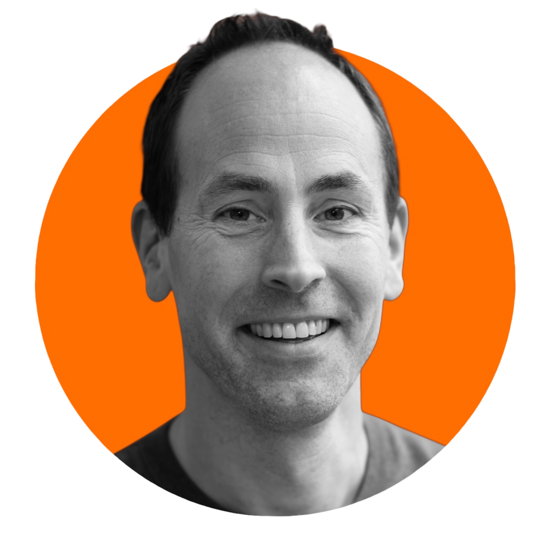 Smiling man with orange background